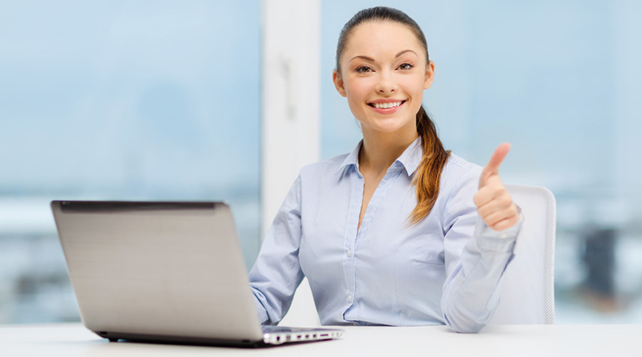 businesswoman with laptop in office